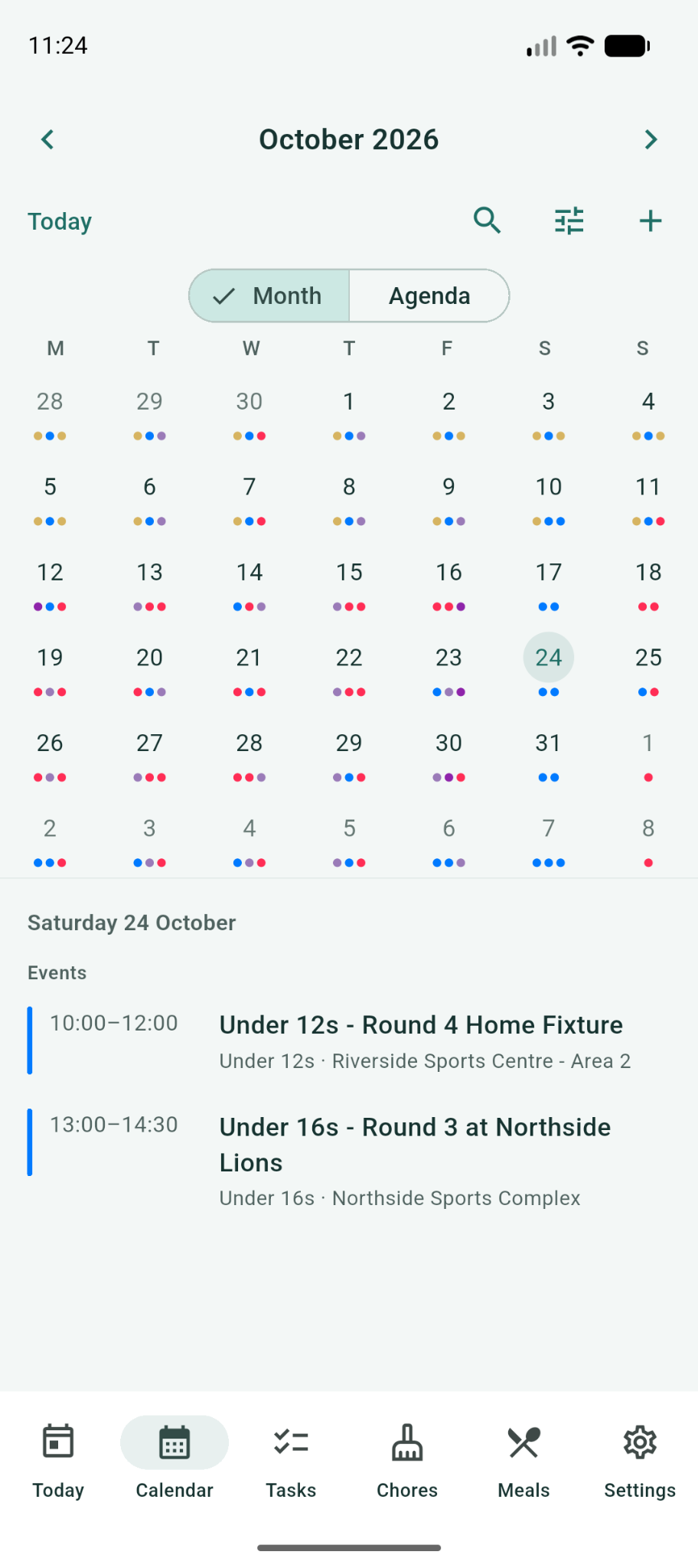 The Calee mobile app showing October with Saturday 24 selected. Below the month grid, the day lists two events: Under 12s - Round 4 Home Fixture from 10:00 to 12:00 at Riverside Sports Centre Area 2, and Under 16s - Round 3 at Northside Lions from 13:00 to 14:30 at Northside Sports Complex